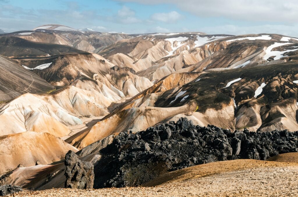 Breathtaking view of Landmannalaugar's colorful mountains and rugged terrain, Iceland.