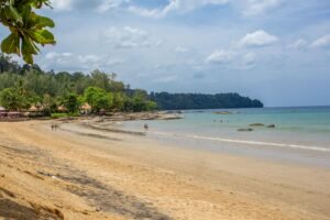 Discover serenity on a tropical beach in Khao Lak, Thailand, perfect for a relaxing vacation.