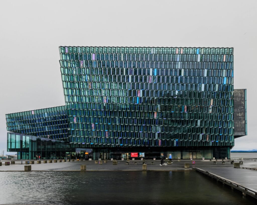 The stunning glass facade of Harpa Concert Hall in Reykjavík, Iceland.