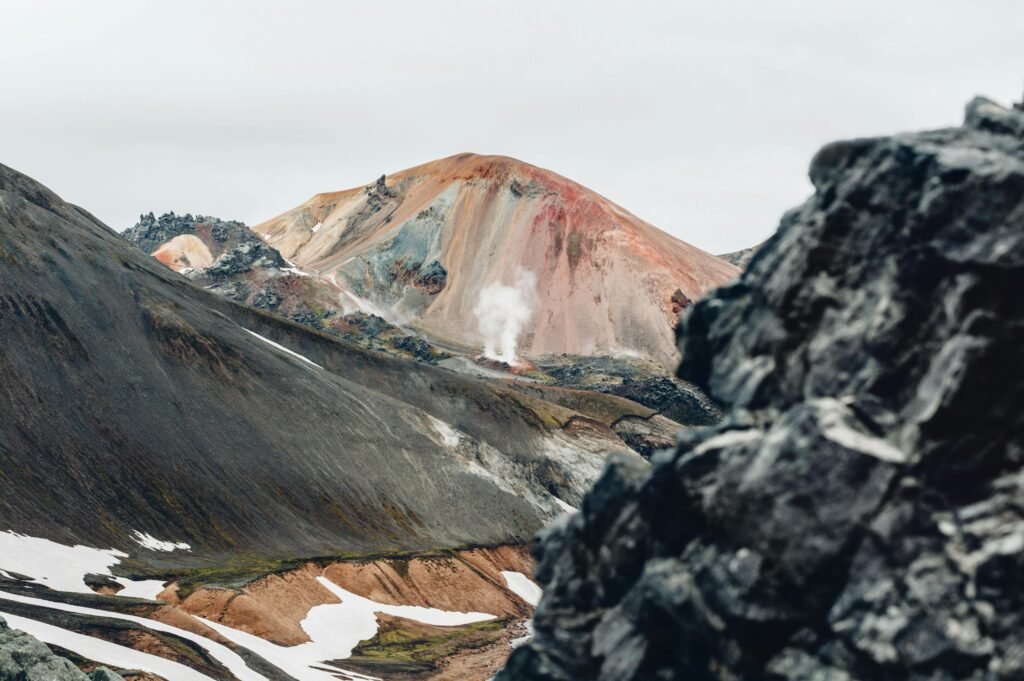 Capture of the vibrant geothermal landscape in Landmannalaugar, Iceland. Perfect for nature enthusiasts.